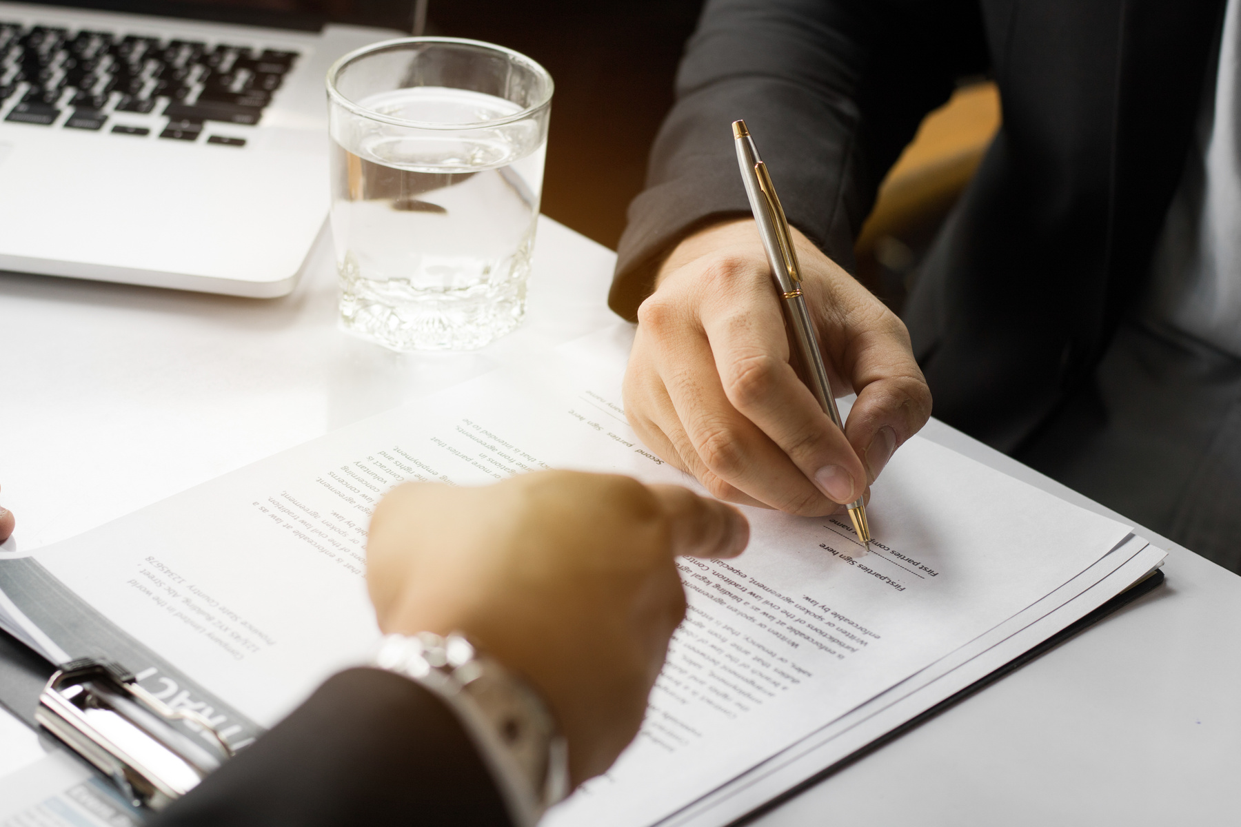 Businessman Signing Contract Paper with Partner, Reach Agreement